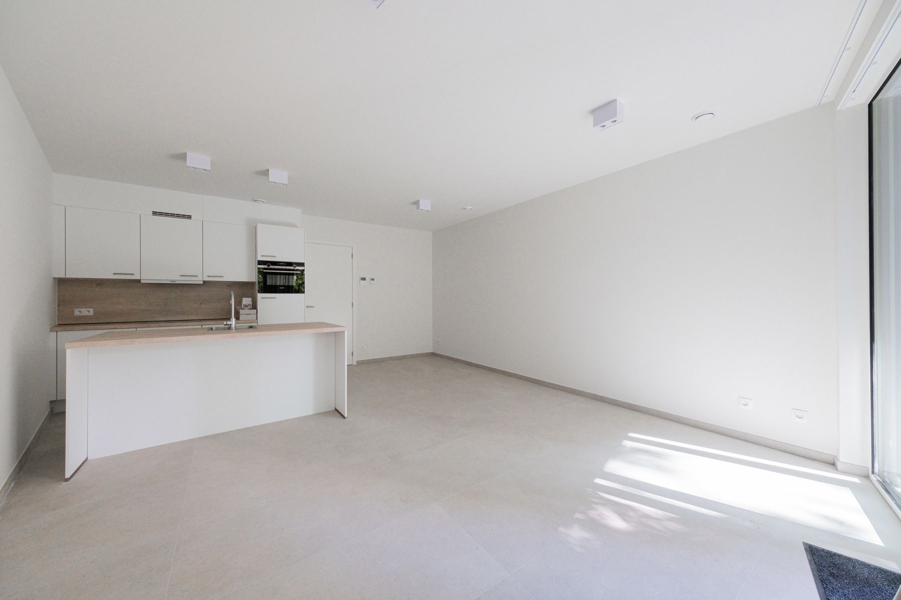 Nieuwbouwappartement op toplocatie met terras! foto 3