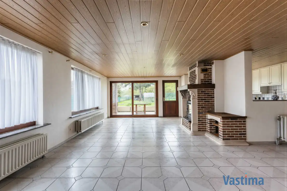 Ruime halfopen bungalow met grote kelder, 3 slaapkamers en zonnige tuin foto 11