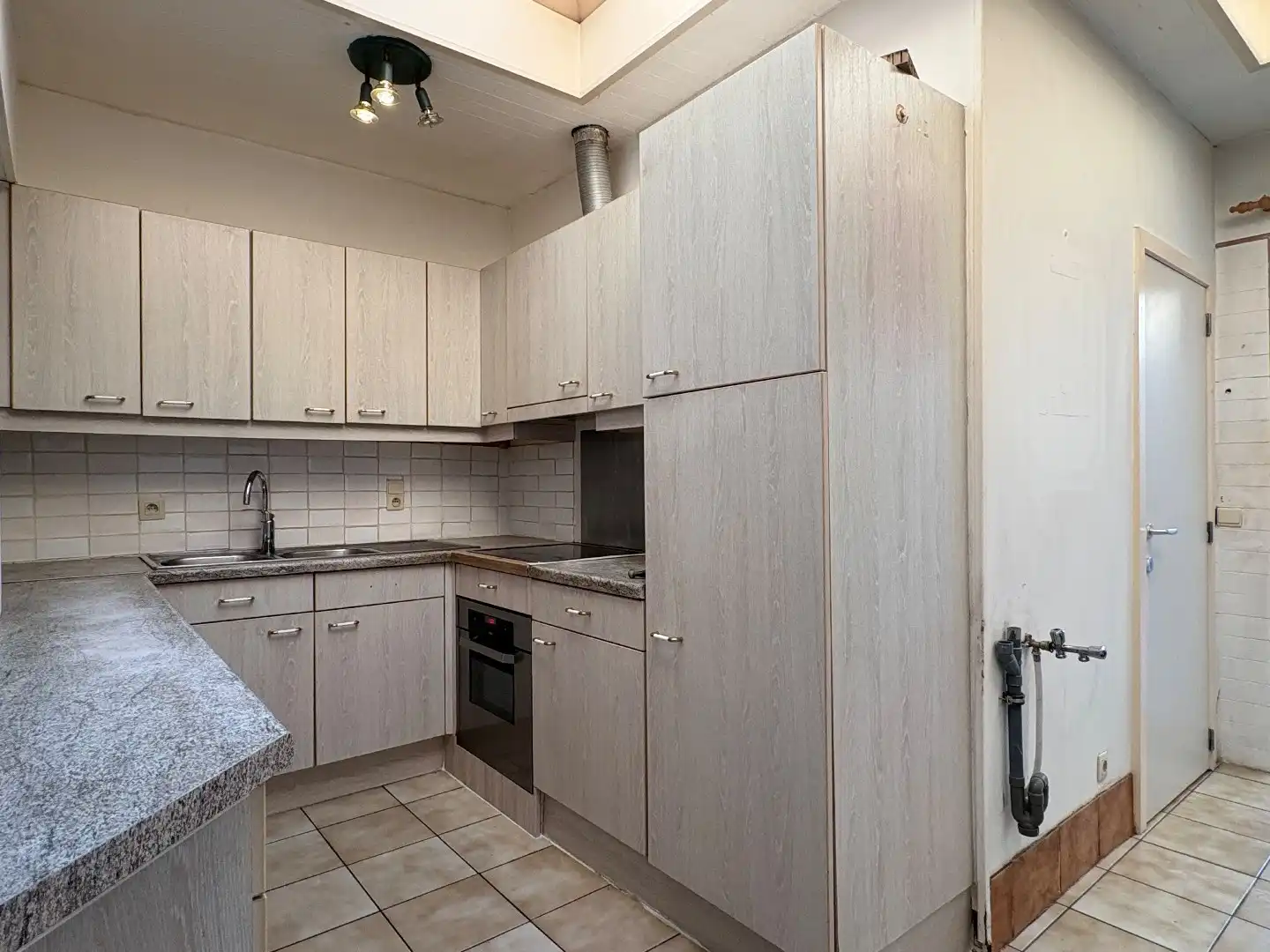 Verhuurde woning te koop in Harelbeke met mogelijkheid tot 3 slaapkamers  foto 6
