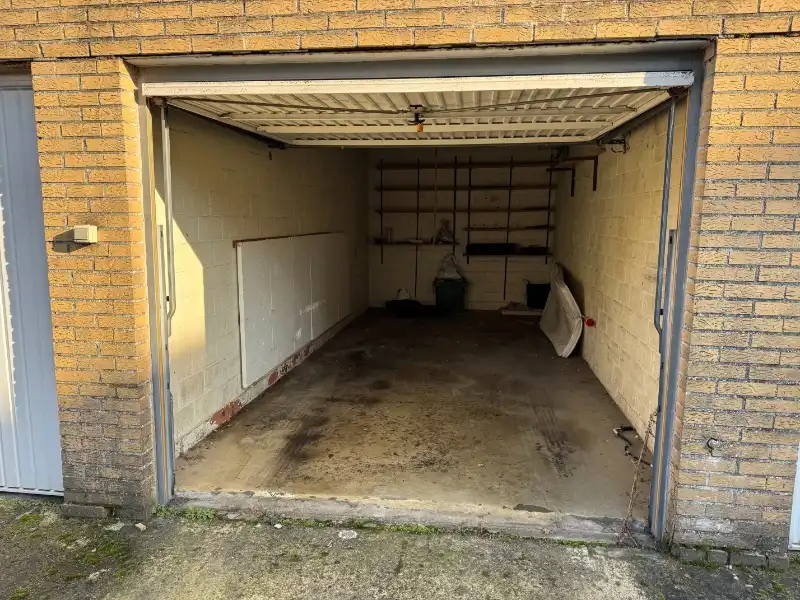 Gelijkvloers 2 slpk. appartement met tuin en garage foto 17