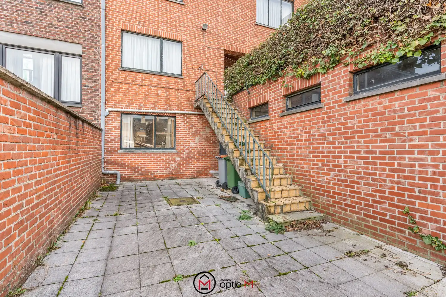 Karaktervolle woning met tuin te koop in centrum Bilzen foto 4