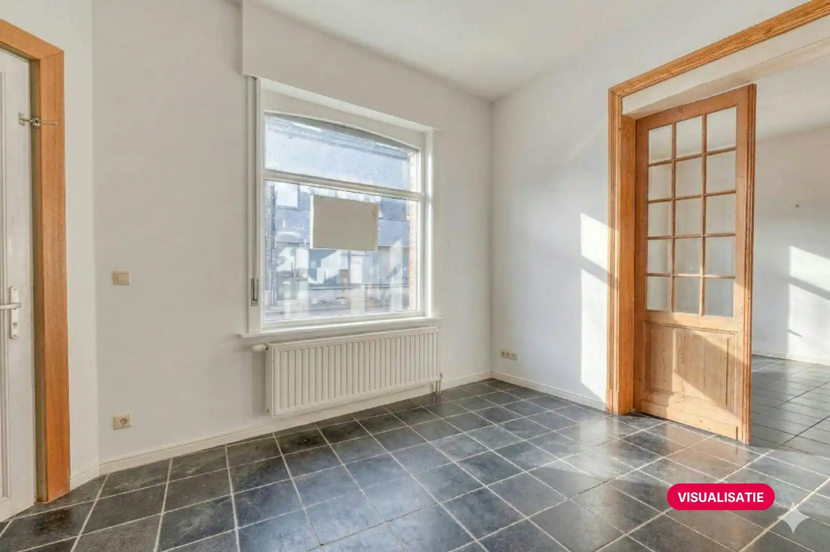 Gezellig huis met met 3 slaapkamers, leuke stadskoer en garage foto 4
