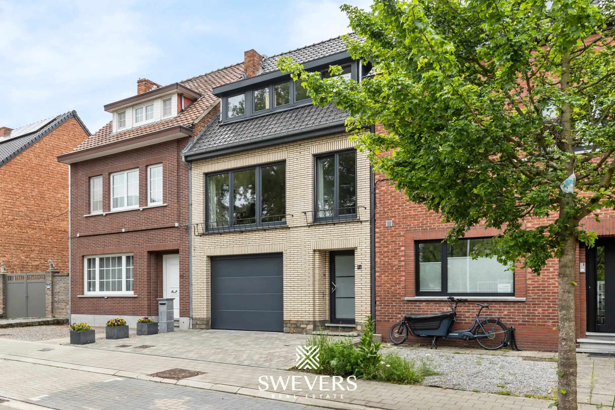 Instapklare rijwoning met 2 zeer ruime slaapkamers en uitstekende ligging foto 23