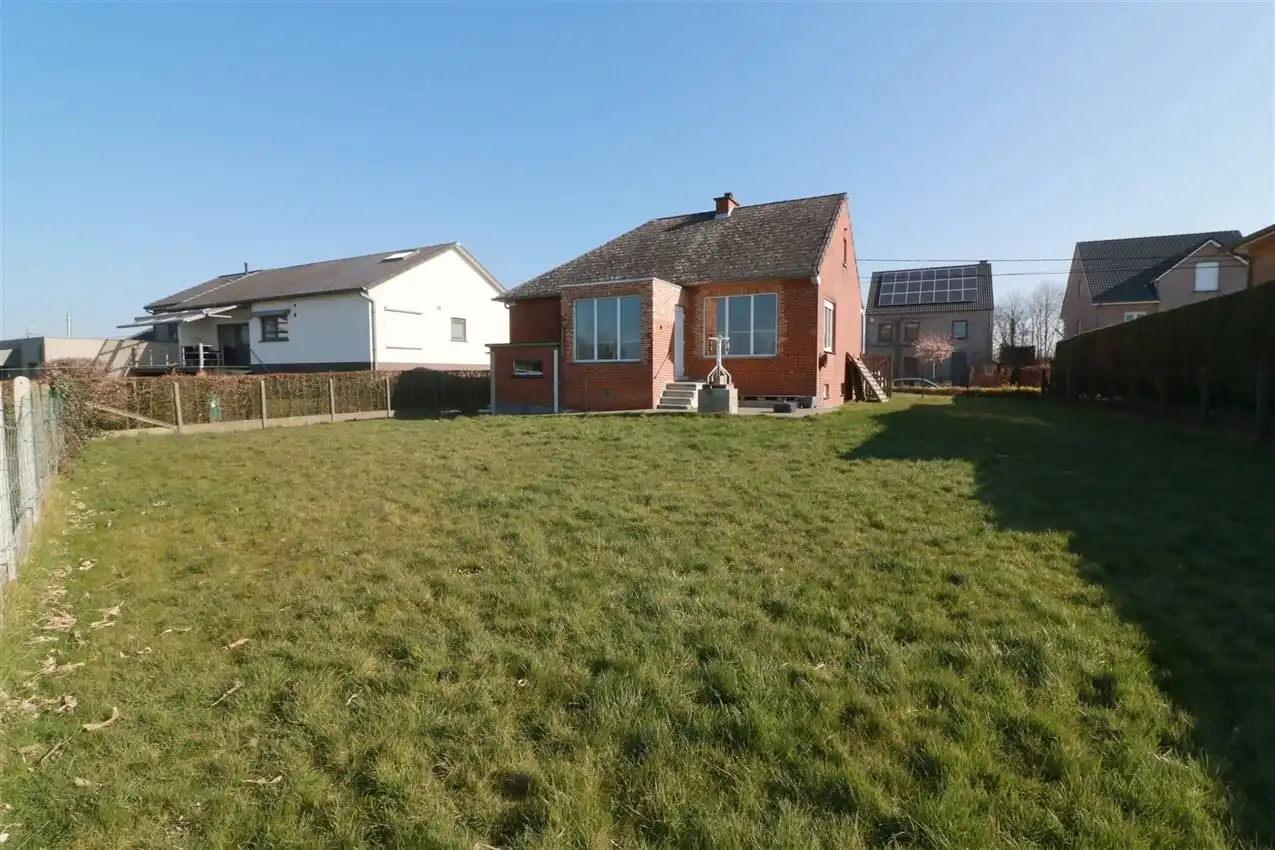 Gusting gelegen woning met 2 slpk, garage en tuin foto 30