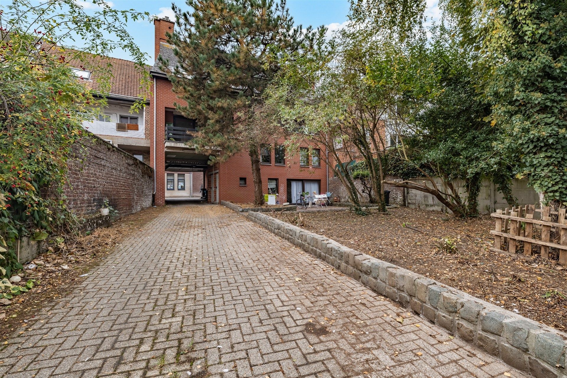 Opbrengsteigendom bestaande uit 4 appartementen + 22 garageboxen + magazijn/werkplaats foto 20