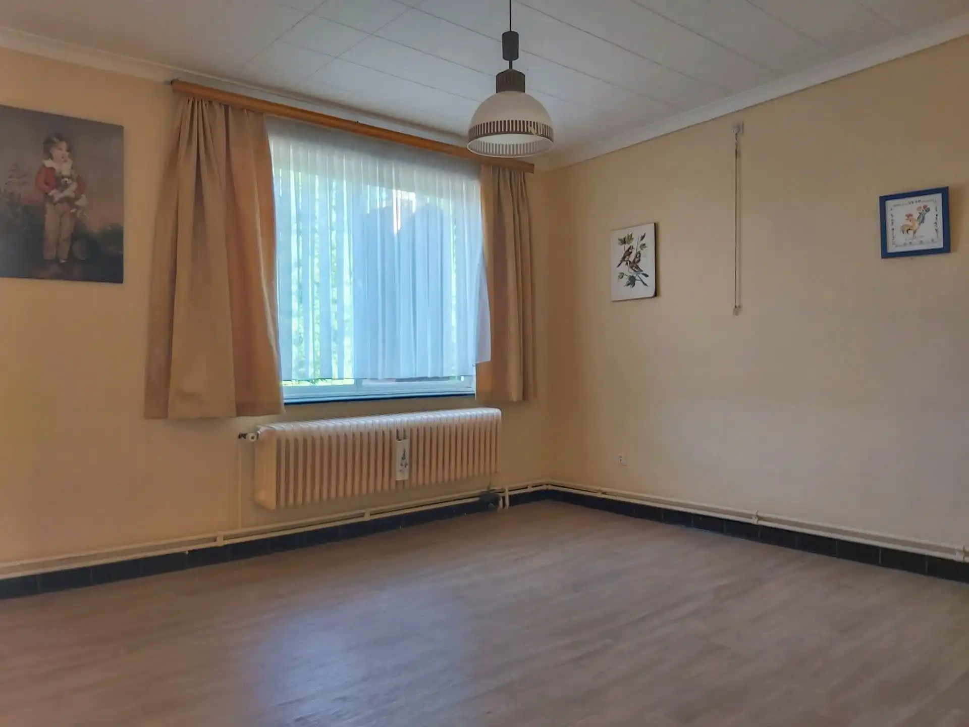 Te renoveren woning met 3 slaapkamers, garage en tuin in Maasmechelen! foto 9