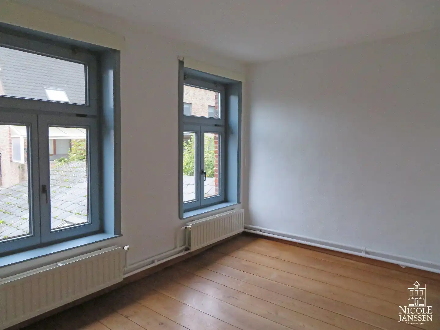 Charmant stadshuisje met drie slaapkamers en tuintje foto 11