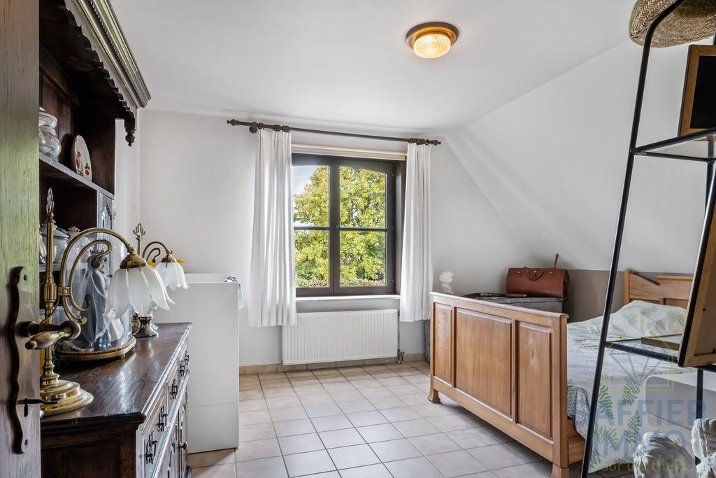 Ruim appartement met 3 slaapkamers, garage en tuin te huur foto 9