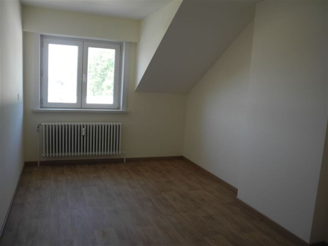 Opbrengsteigendom (handel & 4 app) op toplocatie foto 77