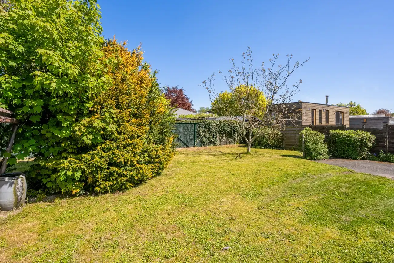 Architecturale gelijkvloerse open woning met inpandige garage op toplocatie nabij het centrum van Lochristi! foto 6