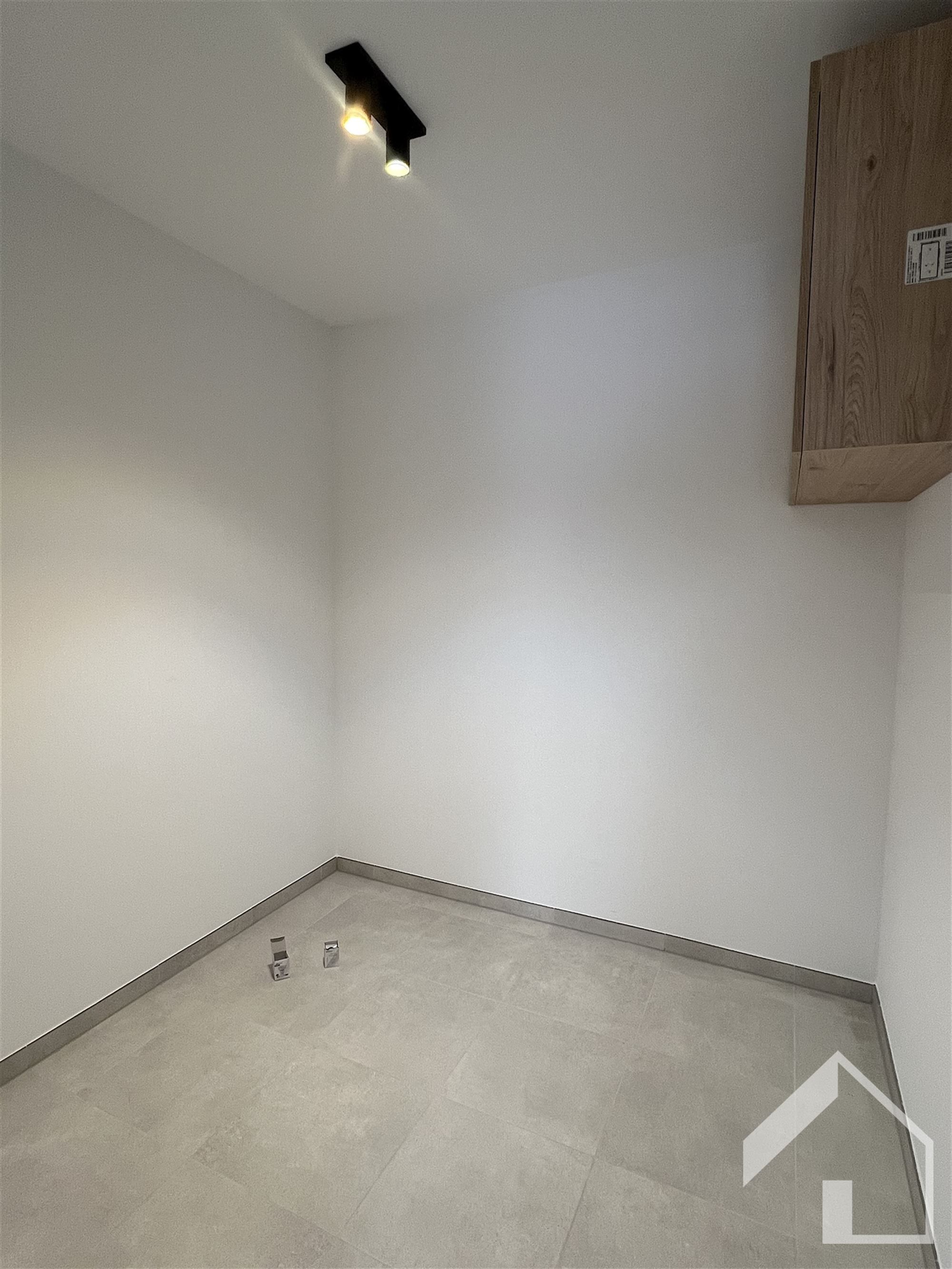 Nieuwbouwappartement met staanplaats en kelderberging foto 10