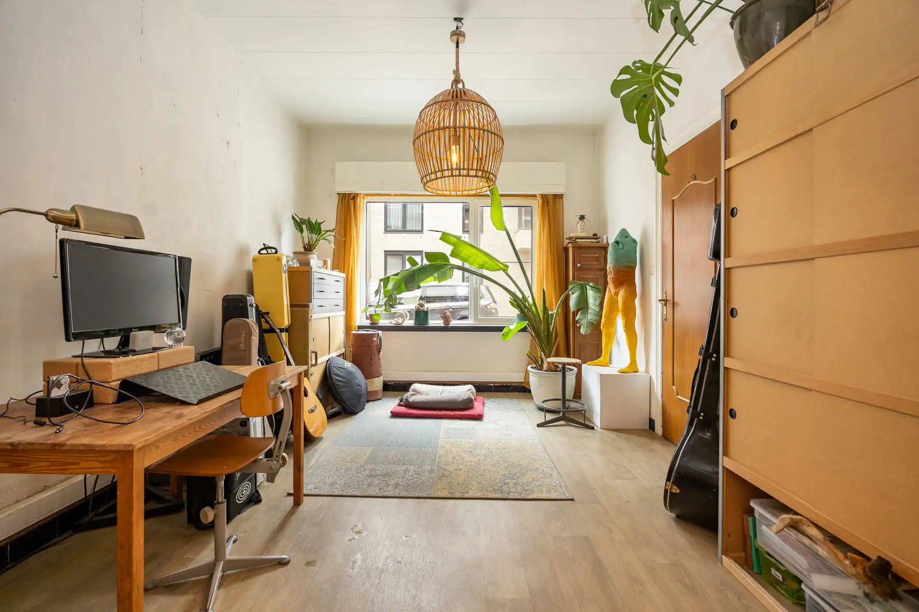 Stadswoning op een perceel van 230 m² met toegang achteraan de tuin. foto 2