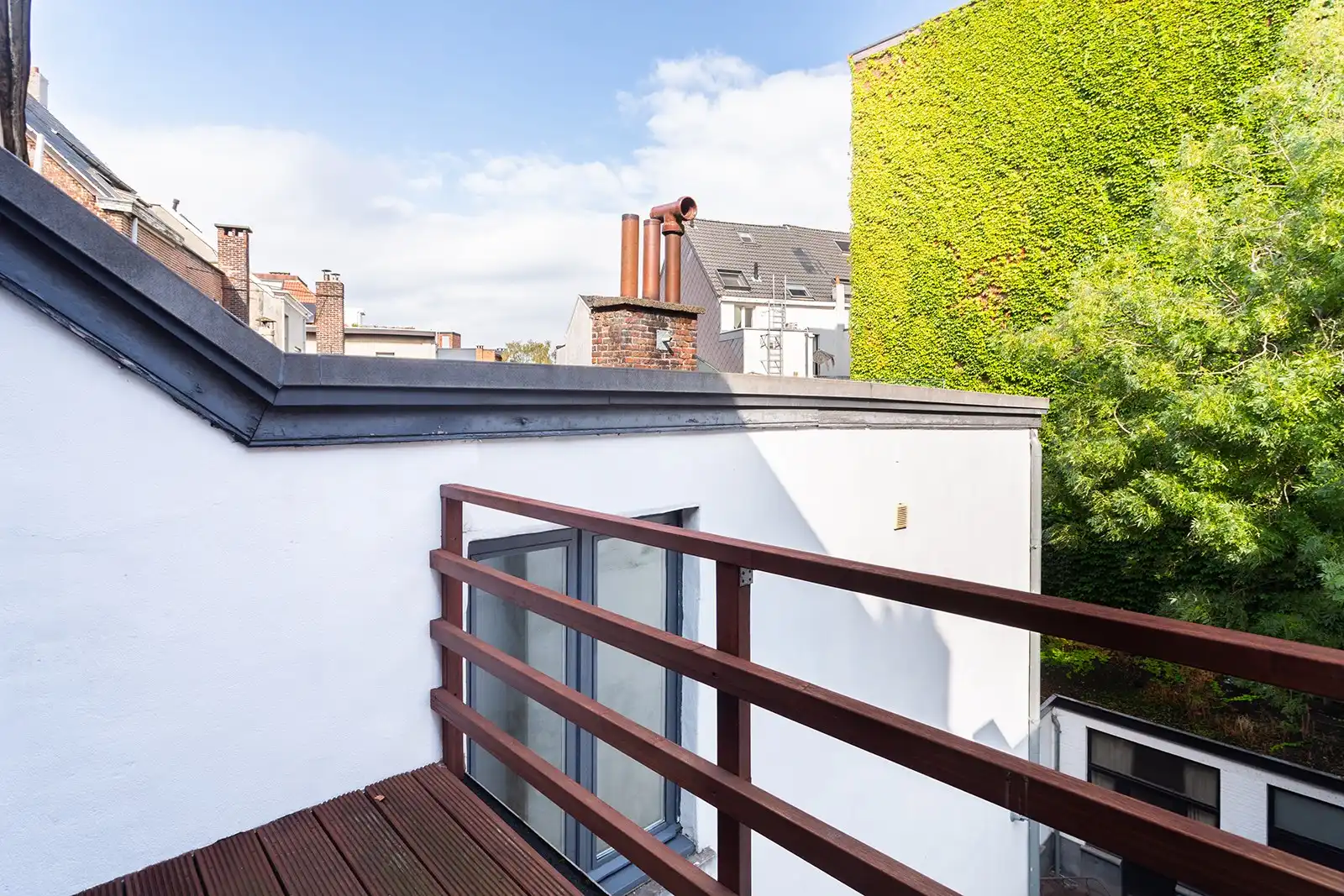 Duplex met terras in bruisende buurt foto 10