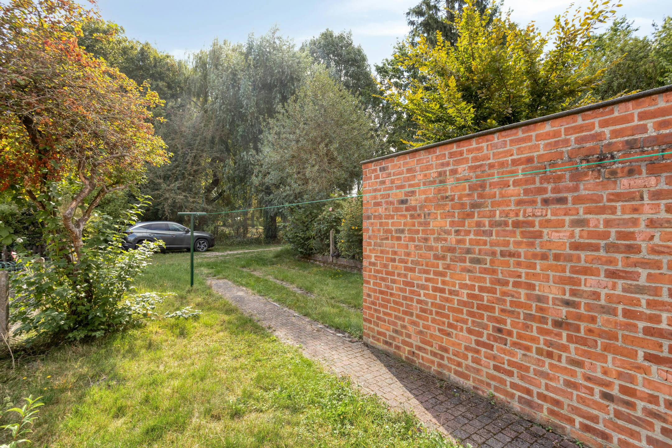 Rustig gelegen gezinswoning met 3 slaapkamers en garage nabij centrum Hasselt foto 14