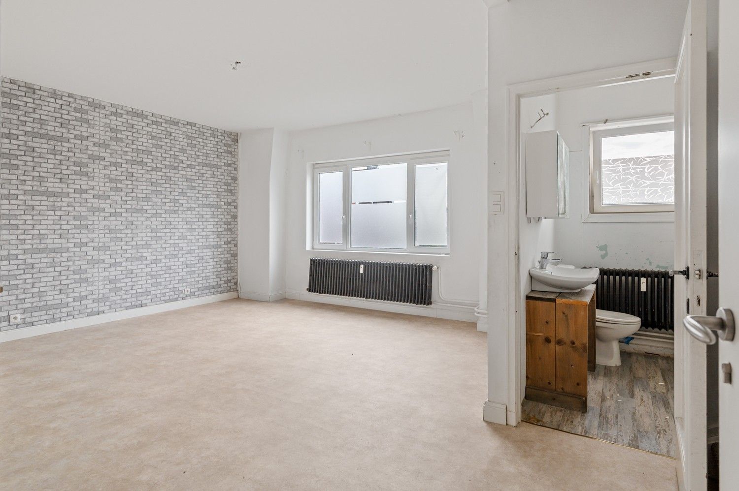 Te renoveren kangoeroewoning  nabij het centrum van Broechem! foto 5