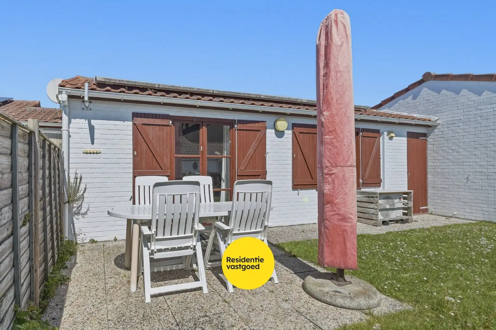 Instapklare vakantiewoning met zonnige tuin en 2 slaapkamers foto 16