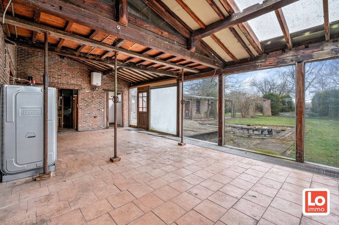 VERKOCHT!! Ruime alleenstaande volledig te renoveren woning met afzonderlijke garage op een makkelijk bereikbare locatie in Desteldonk. foto 22
