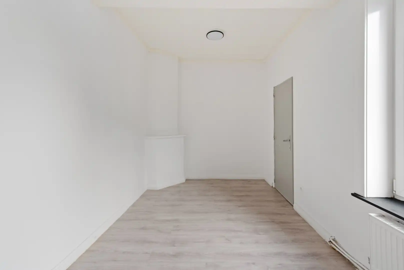 Polyvalente rijwoning met grote handelsruimte te Tienen foto 13