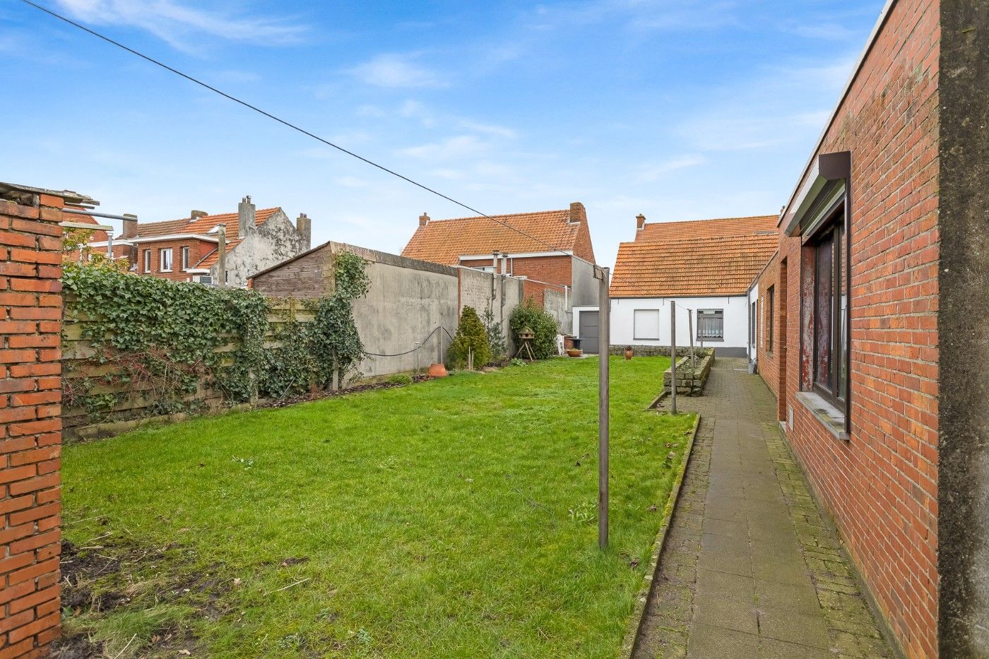 Rustig gelegen woning met 2 slpk., atelier, tuin en dubbele garagebox foto 23