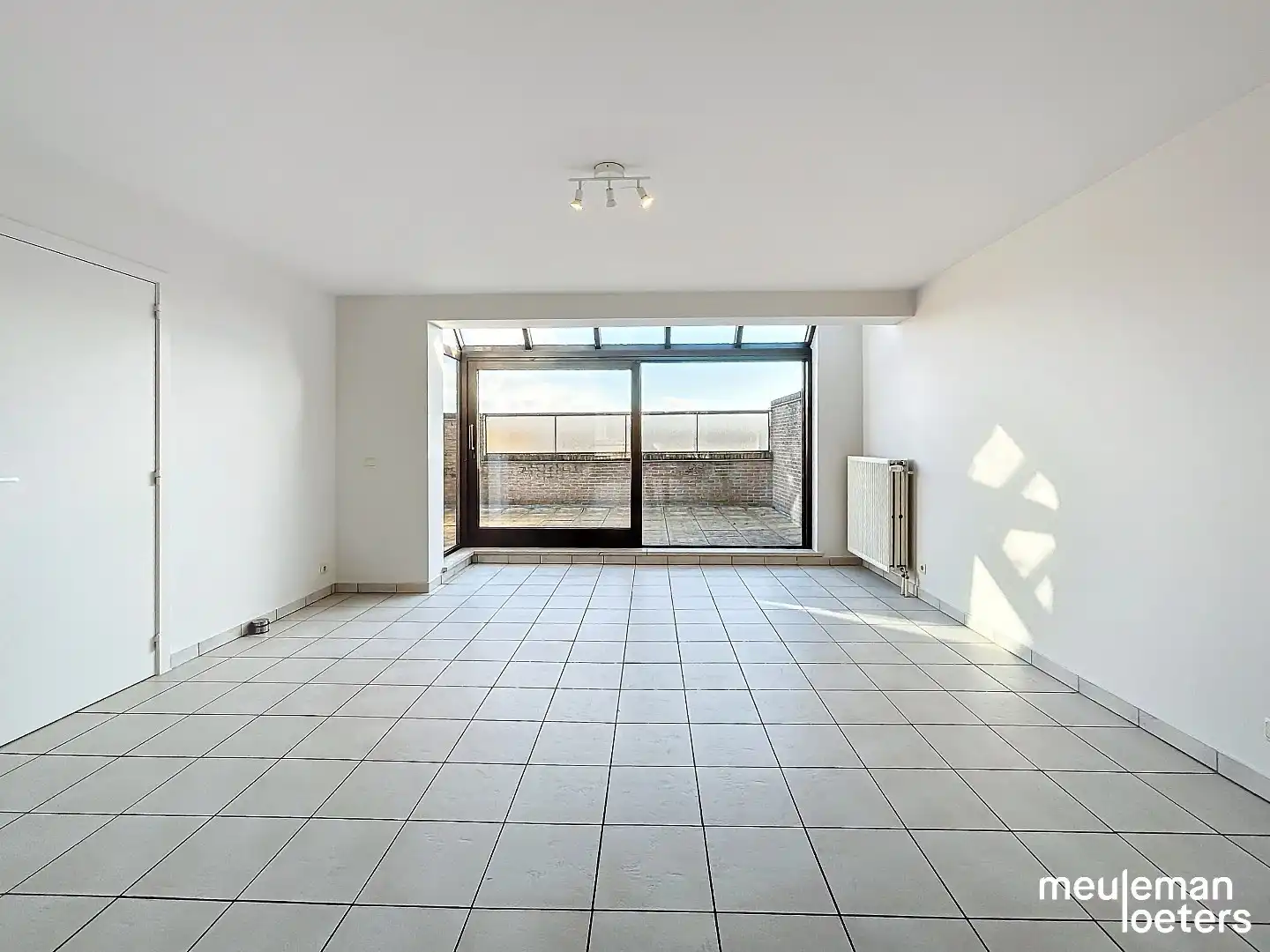 Ruim duplex appartement met garagebox foto 3