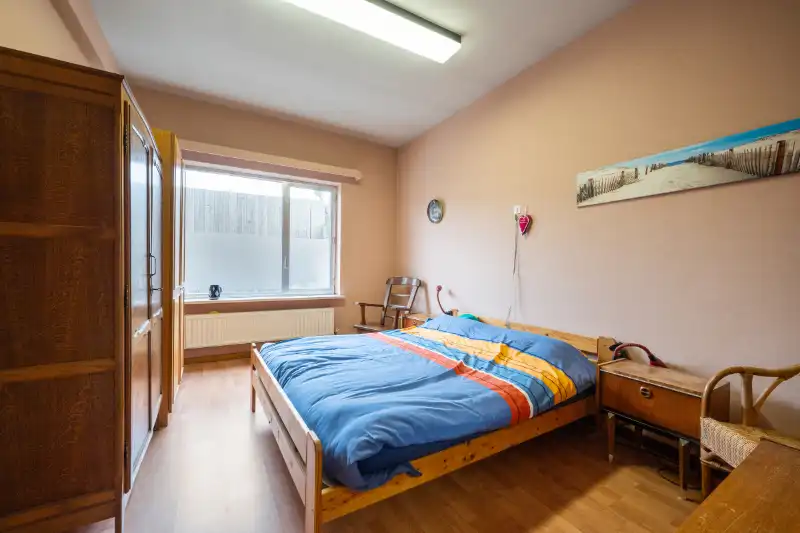 Gelijkvloers appartement met handelsruimte en parking nabij centrum Roeselare foto 11