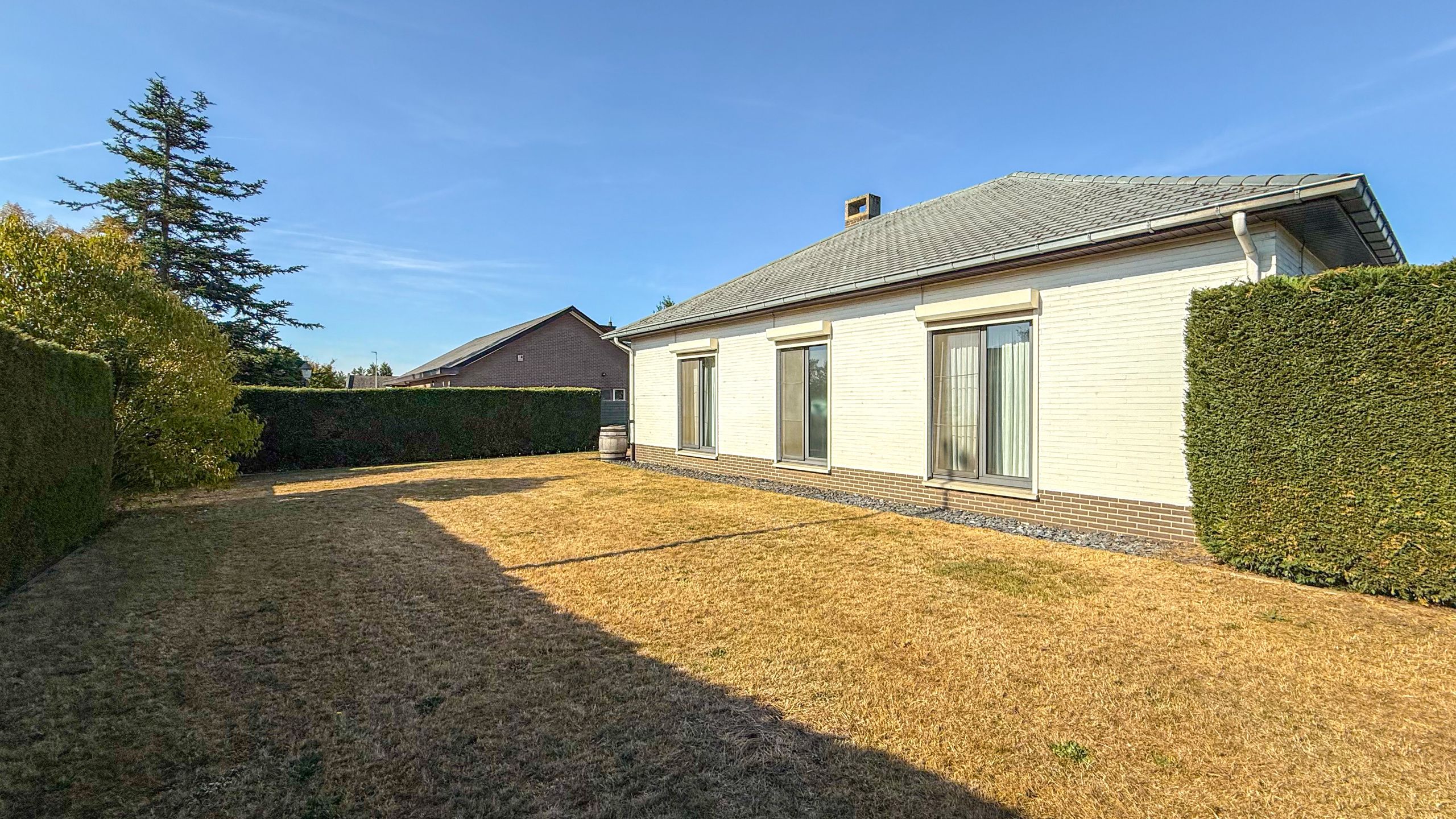 Gerenoveerde gelijkvloerse woning met 3 slpks en garage! foto 37