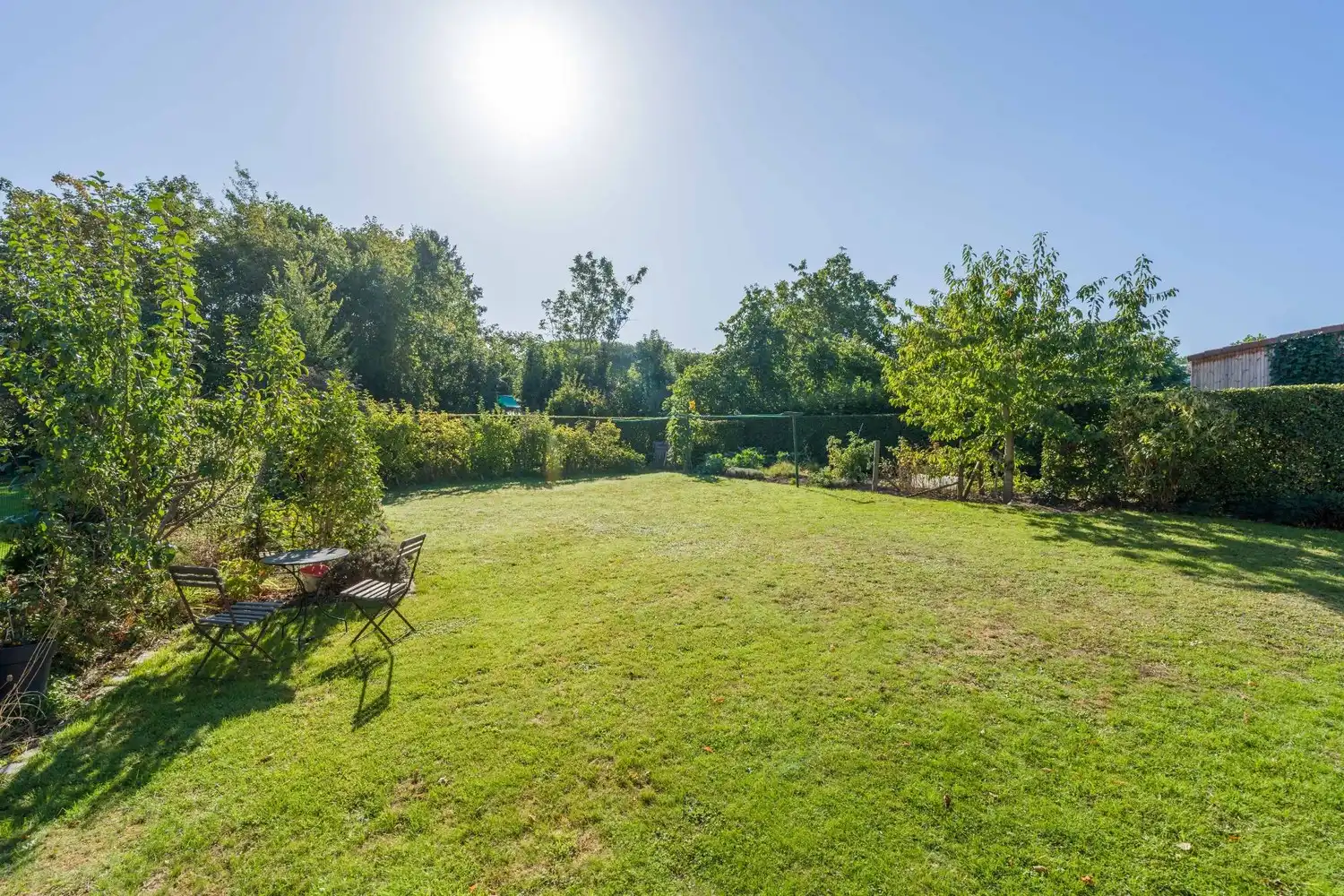 Rustig gelegen en vrijstaande woning met 3 ruime slaapkamers, een oprit met een garage en een mooie tuin in het groene Oud-Heverlee! foto 10