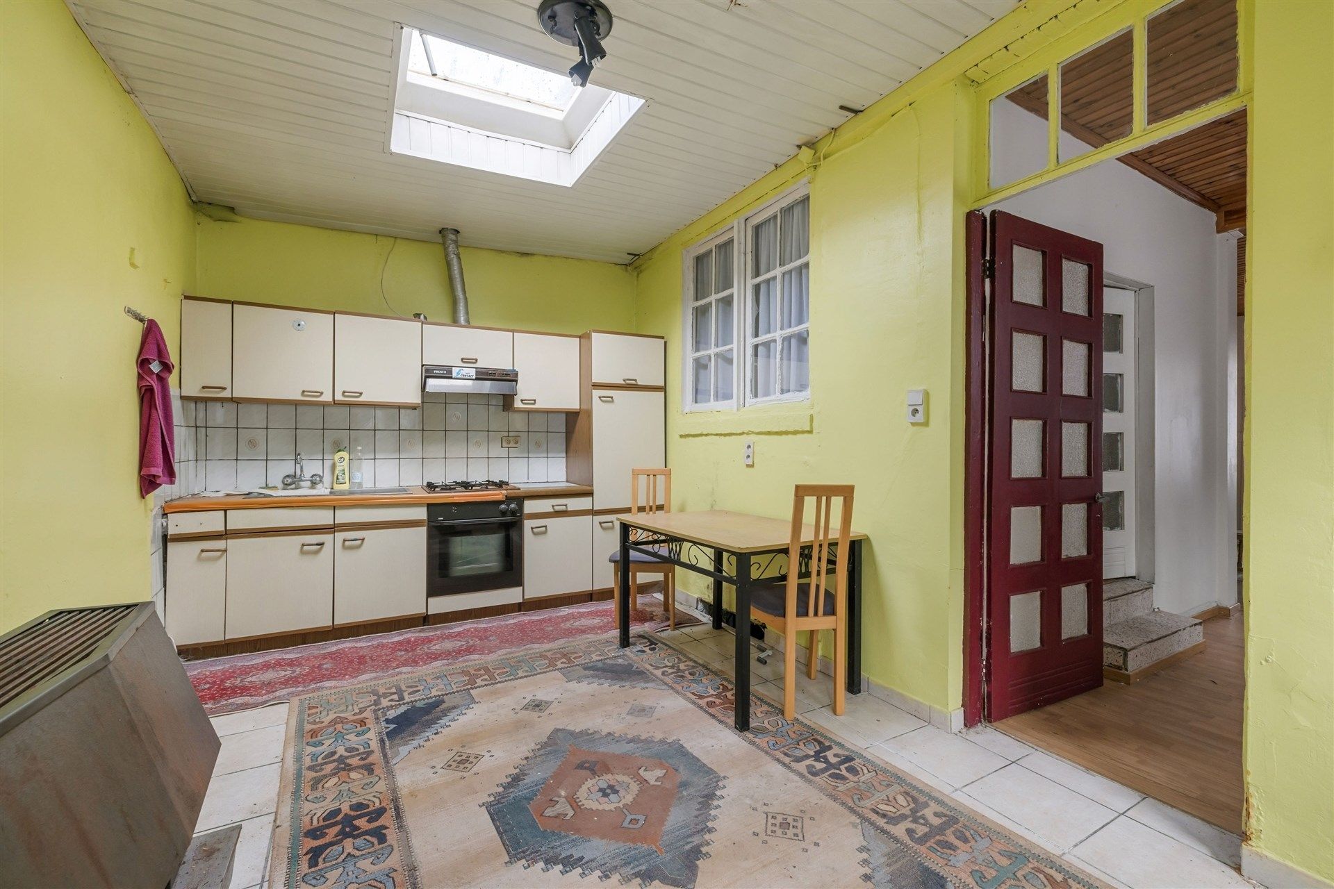 Te renoveren halfopen bebouwing in het centrum van Sint-Gillis-Waas foto 7