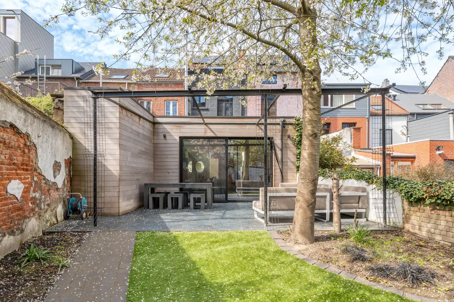 Gerenoveerde en energiezuinige woning met 4 slaapkamers en een tuin met een achteruitgang en een grote garage te centrum Leuven! foto 12