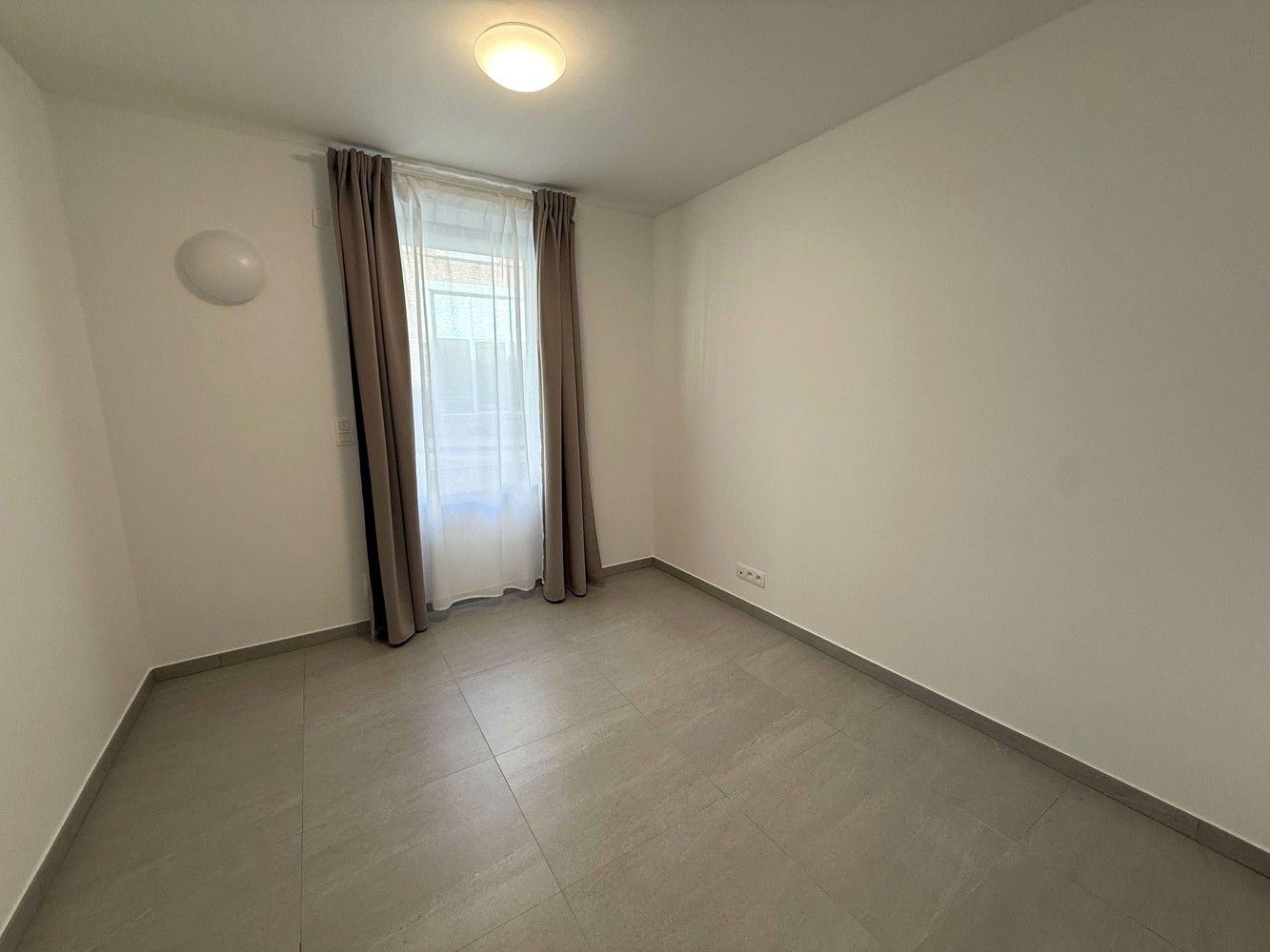 Nieuwbouwappartement met 3 slaapkamers, groot terras en autostaanplaats te huur in centrum Leuven foto 15