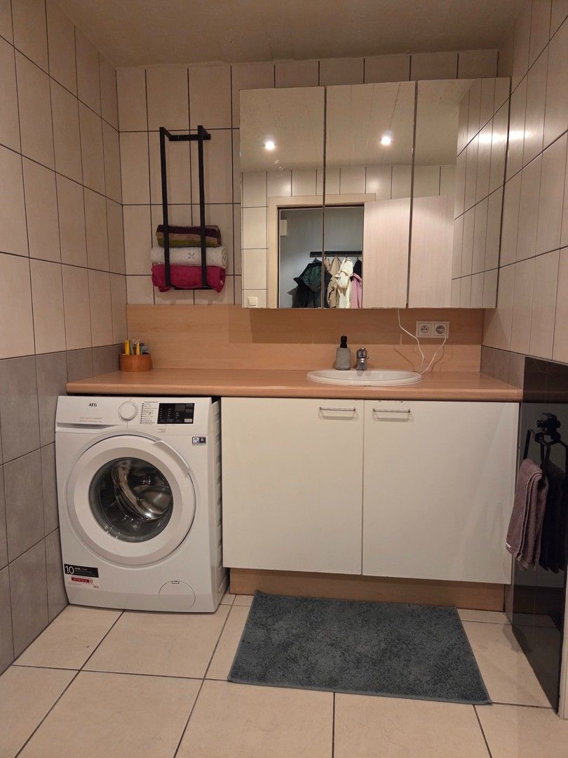 Ruim appartement op het gelijkvloers met tuin en garage foto 7