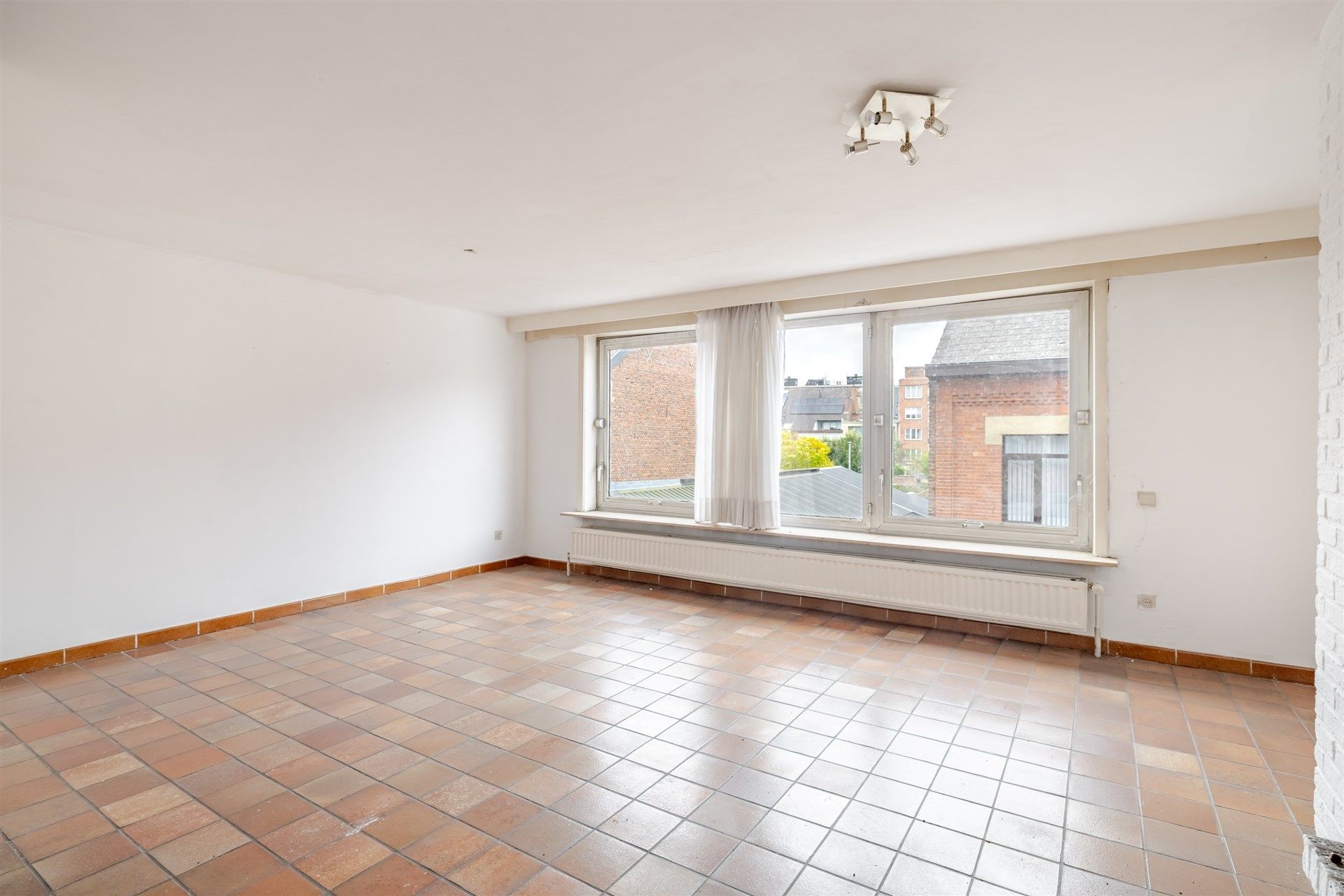 Opbrengsteigendom bestaande uit 2 appartementen + 2 gelijkvloerse autostaanplaatsen foto 13