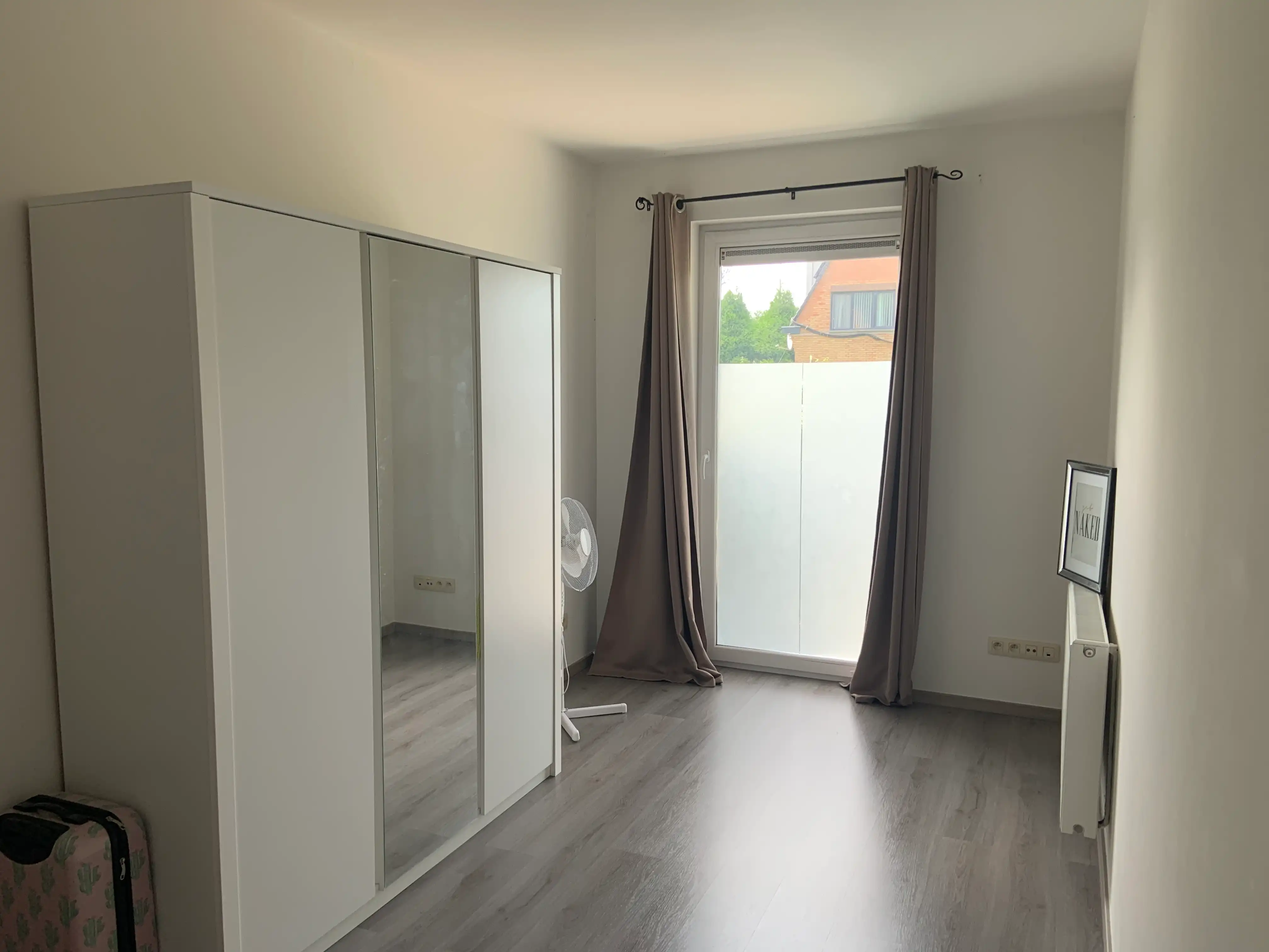 Gelijkvloers tweeslaapkamer-appartement te Wondelgem. foto 9