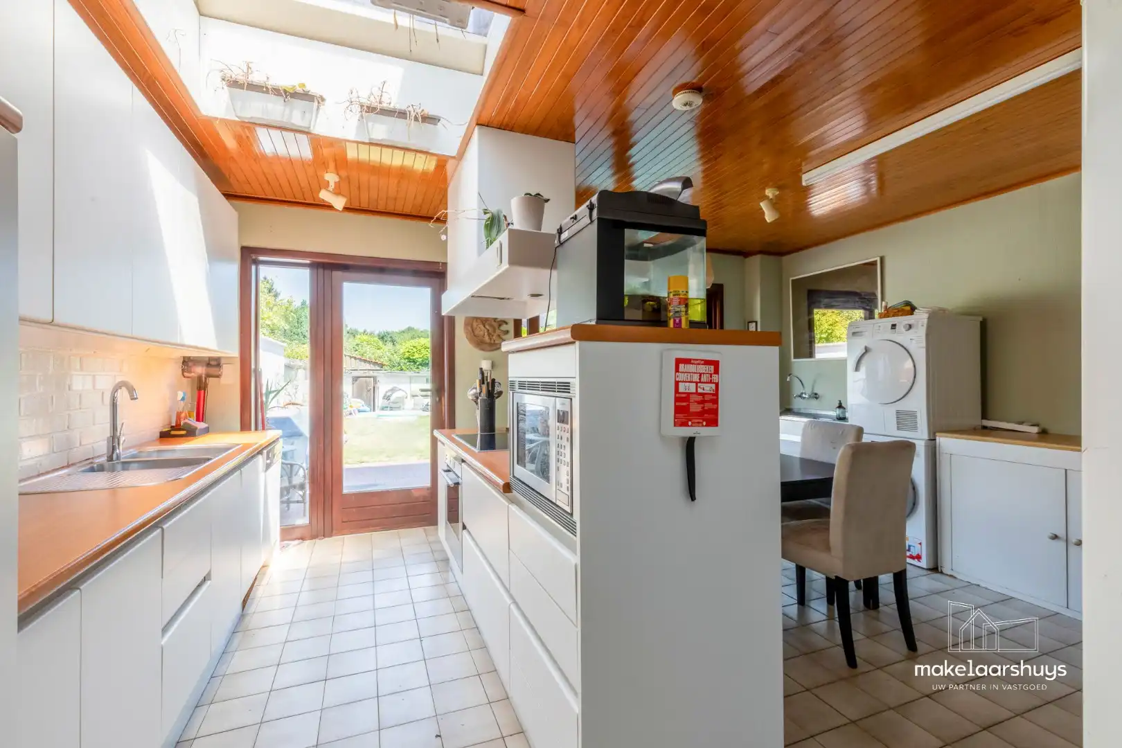 Ruime woning met 4 slpk en aangename tuin te Sint-Amandsberg foto 7