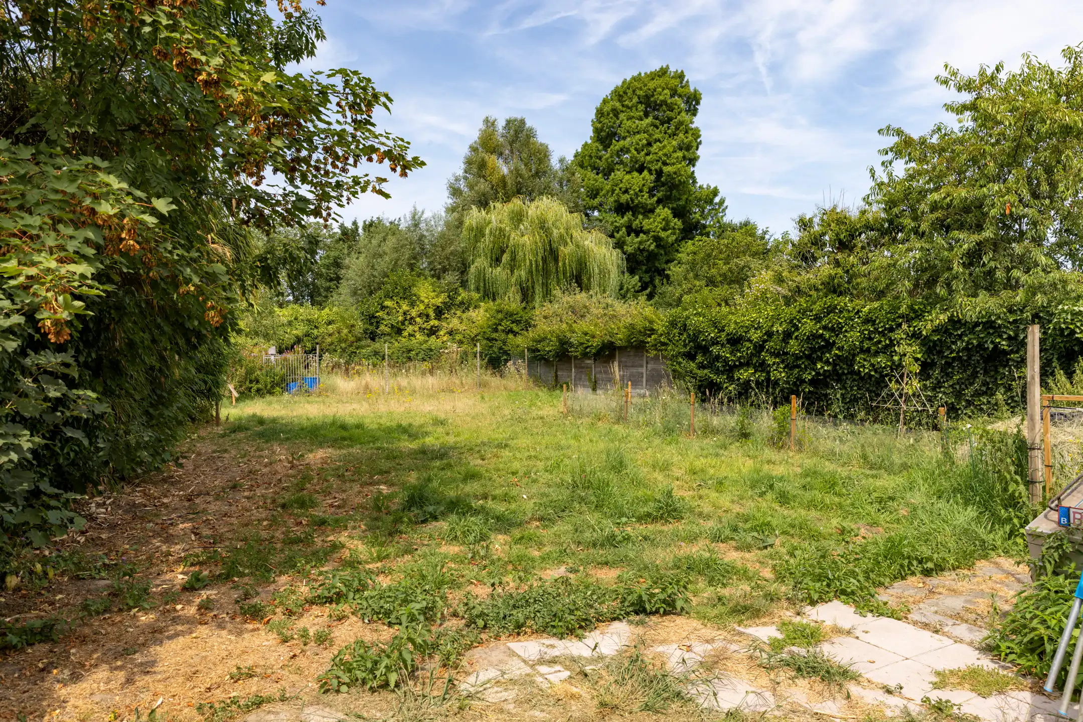 Te renoveren gesloten bebouwing met garage, ruime tuin en groenzicht in Oppuurs foto 10