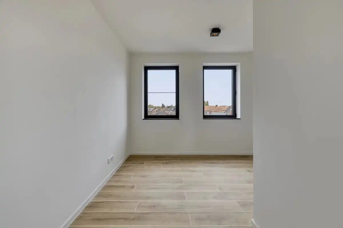 EXCLUSIEF EN KWALITATIEF NIEUWBOUWAPPARTEMENT VAN 163 M² MET 3 SLPK'S, 2 BADK'S EN RIANTE TERRASSEN IN MUNSTERBILZEN foto 25