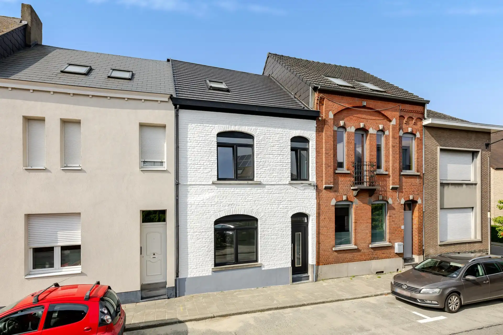 Instapklare, volledig gerenoveerde gezinswoning met 4 slaapkamers, garage en zonnige stadstuin foto 2