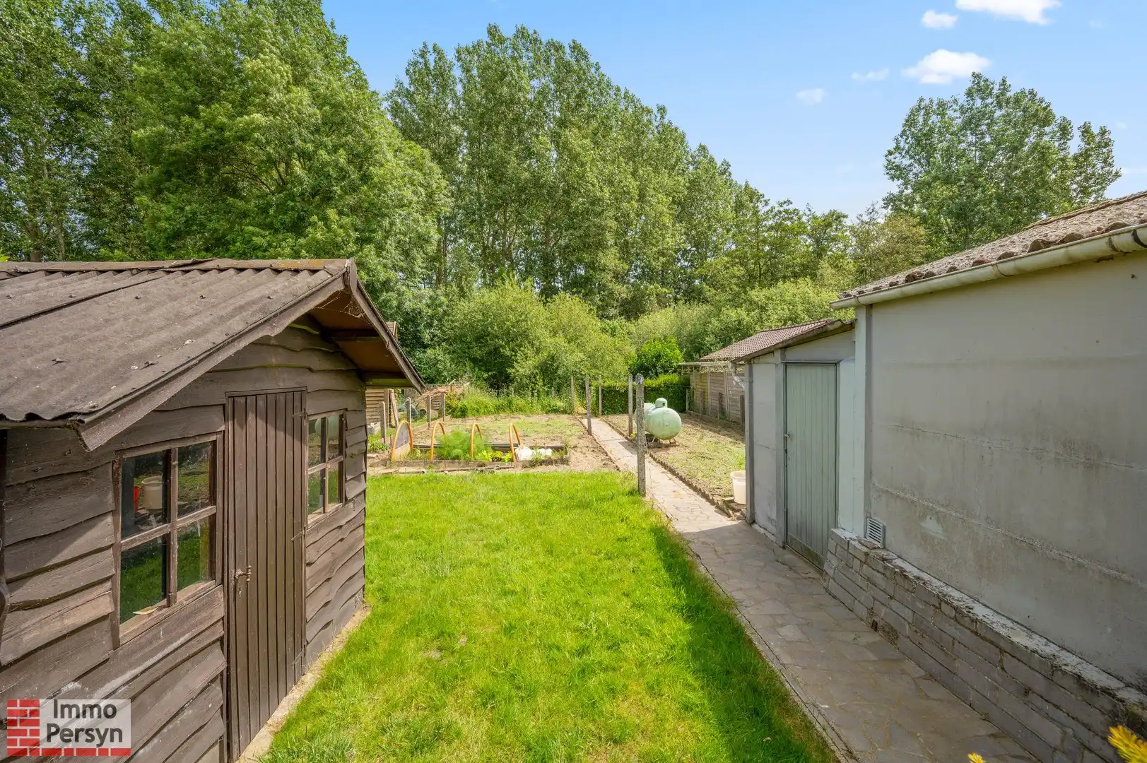 Charmante vrijstaande jaren 50 woning met oprit en tuin foto 27