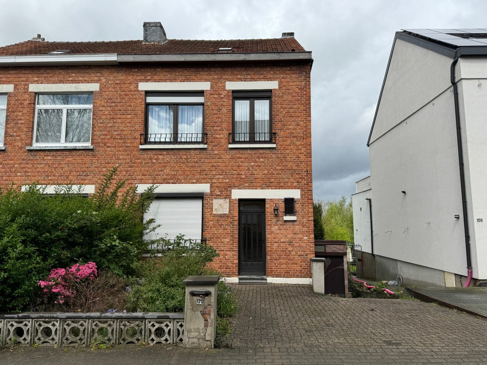 OPTIE Eengezinswoning met 4 slaapkamers, garage en tuin foto 1