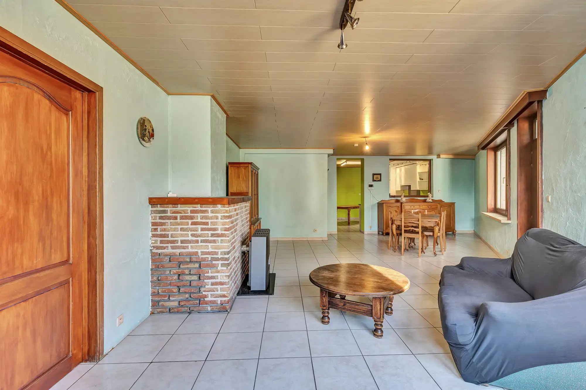 Te renoveren halfopen woning met ruime garage en grote tuin foto 3