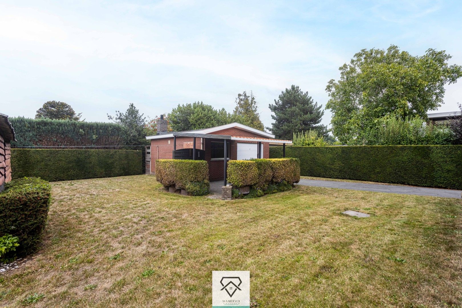 Stevige bungalow met 3 slaapkamers, tuin rondom en garage – centraal in Evergem foto 25
