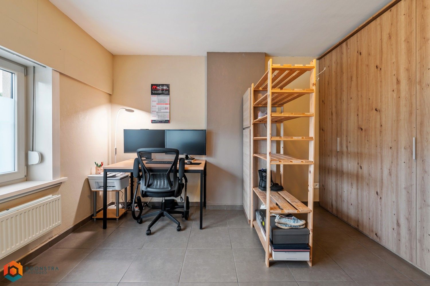 Verzorgde woning met 2 slpkrs, leuke tuin en garage foto 12