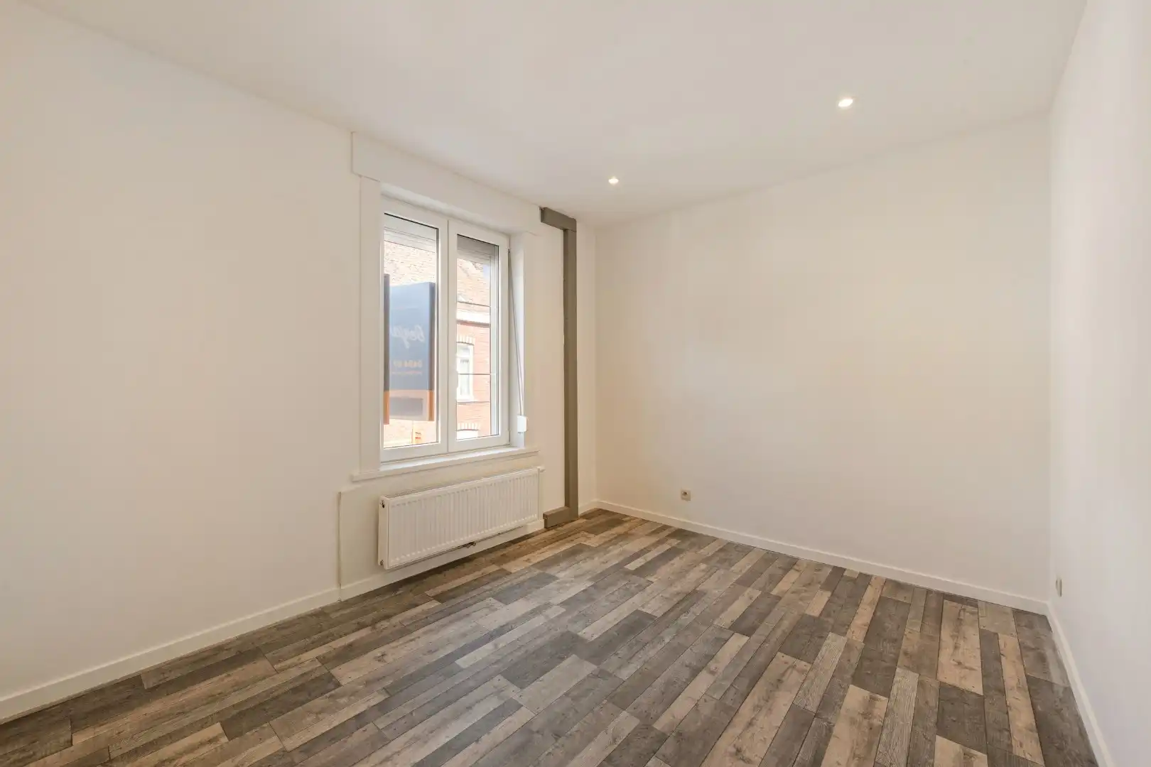 Rijwoning met 2 slaapkamers en ruime zolder in Menen foto 6