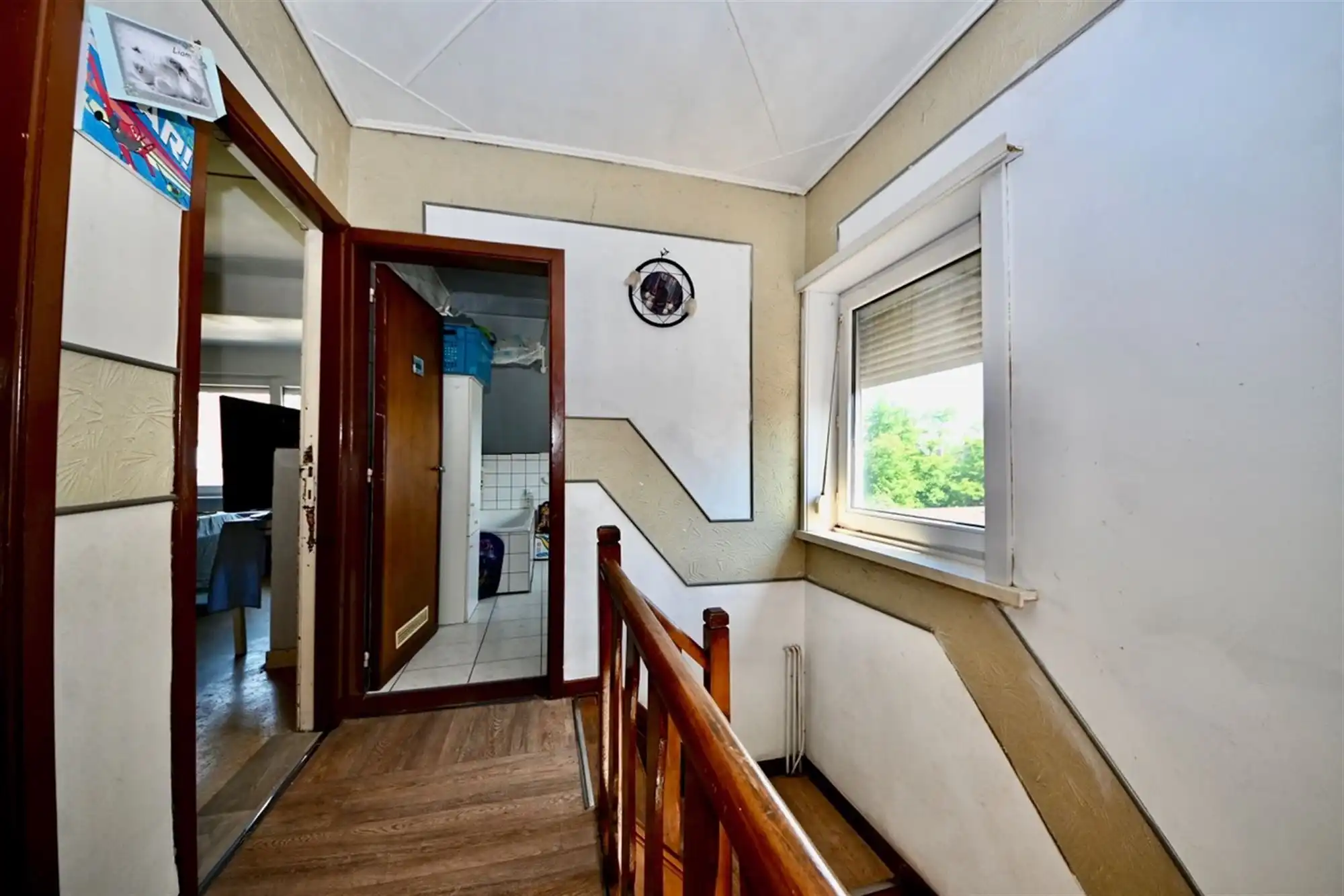 Te renoveren woning met 3 slaapkamers, garage en tuin.  foto 11