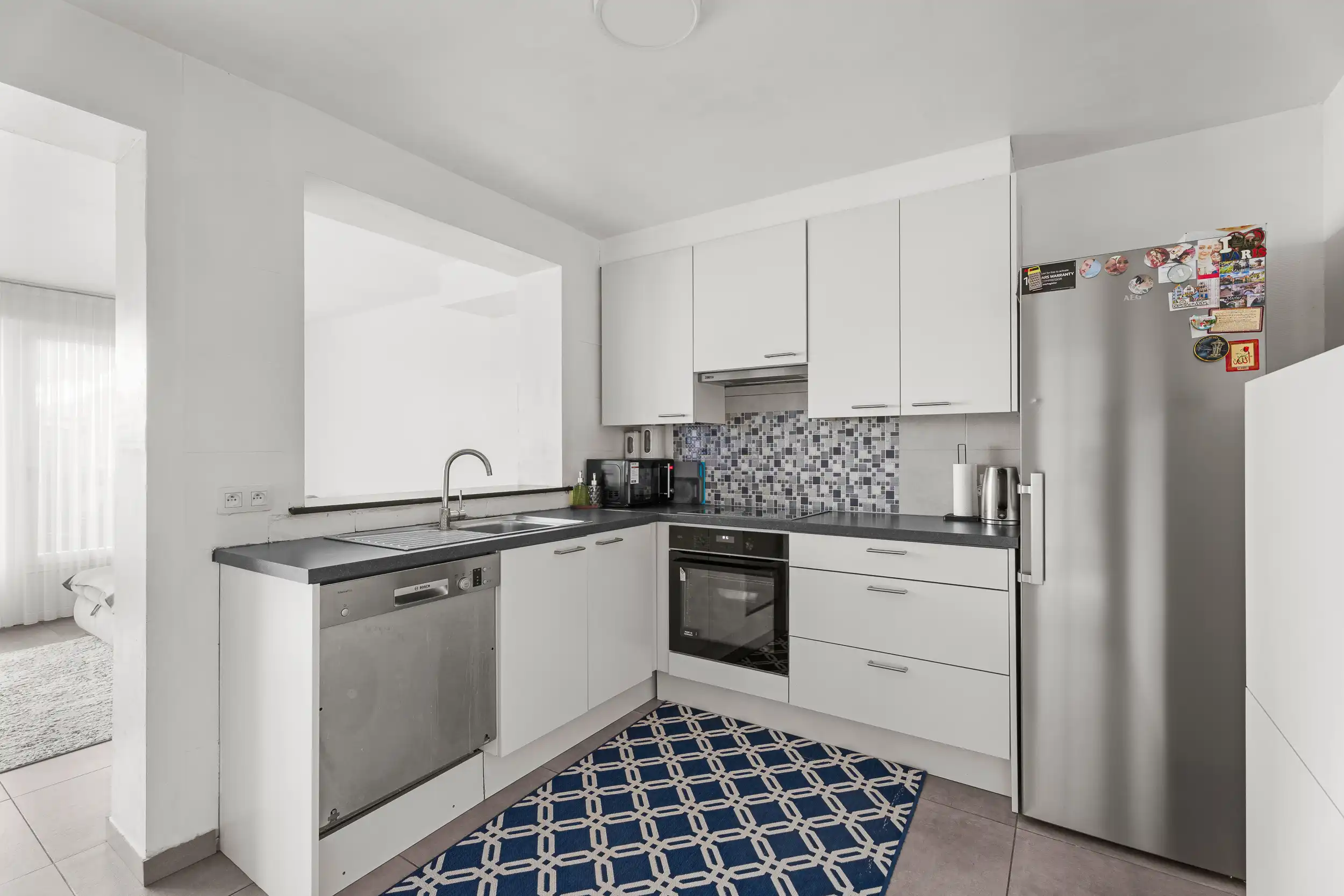 Centrum gelegen gezinswoning met garage en tuin! foto 8