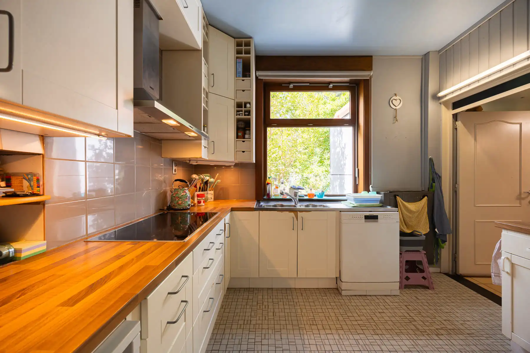 Mooie, gezellige woning met zonnige tuin op een toplocatie foto 11