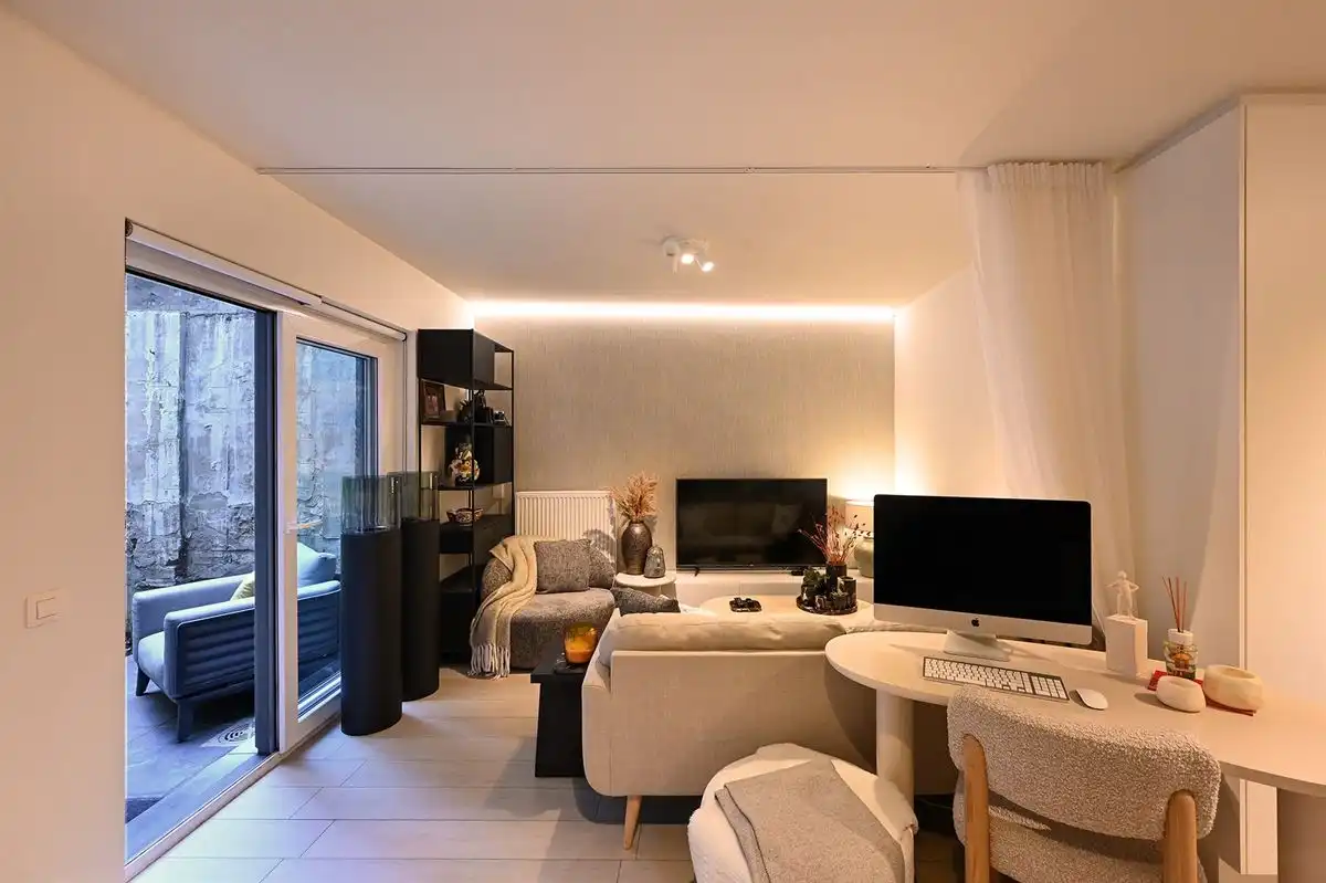 Instapklaar gelijkvloersappartement met heerlijke stadstuin foto 18