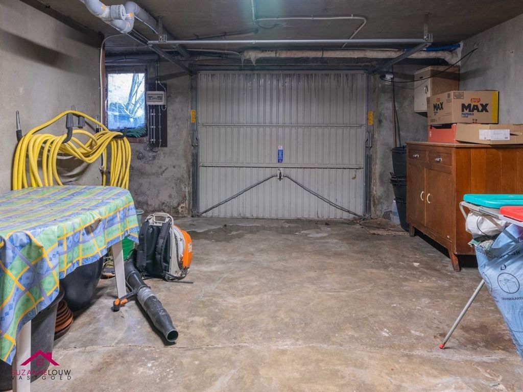Half vrijstaande woning met garage foto 44
