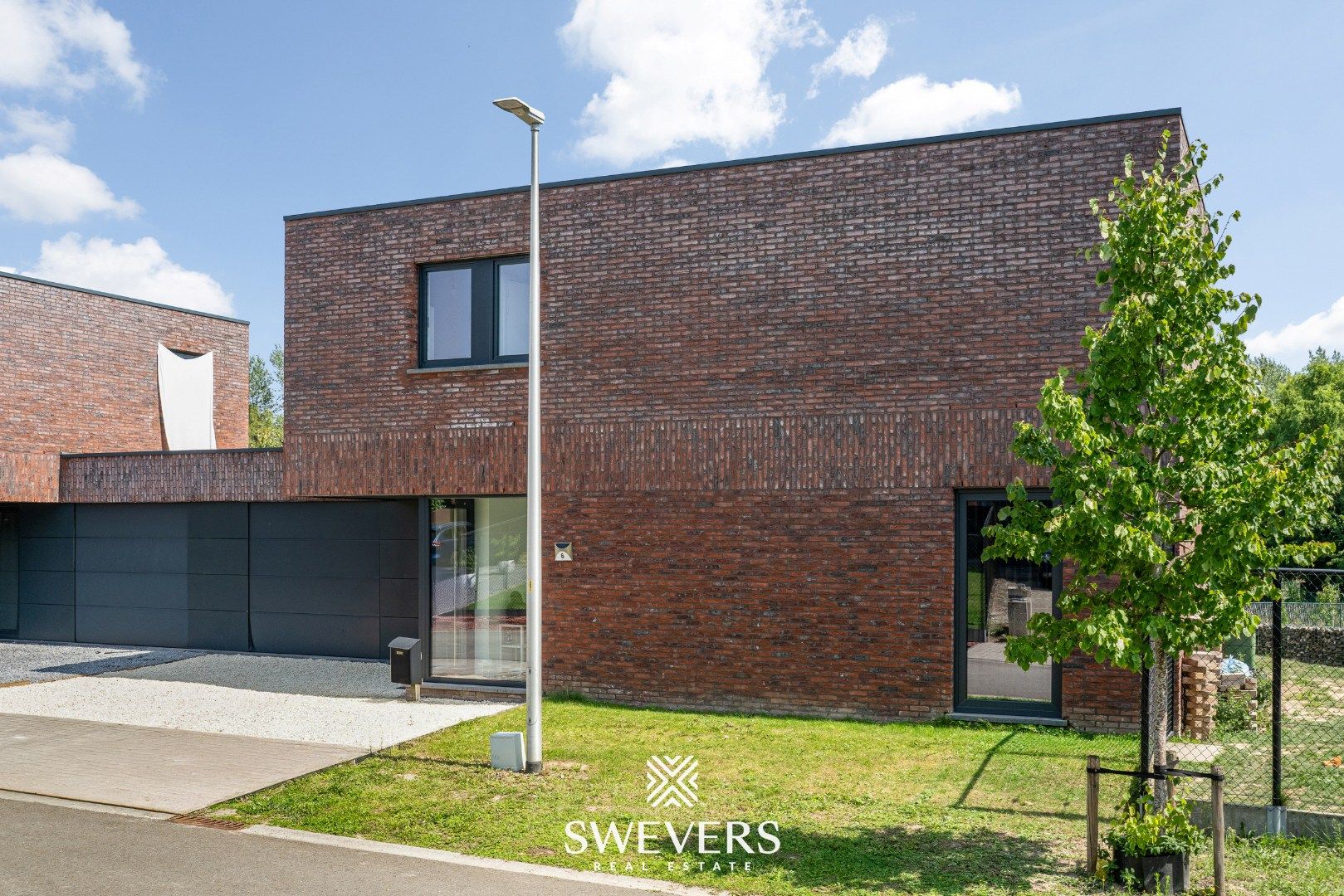 Recente, instapklare en energiezuinige woning op rustige straat te Kortessem foto 28