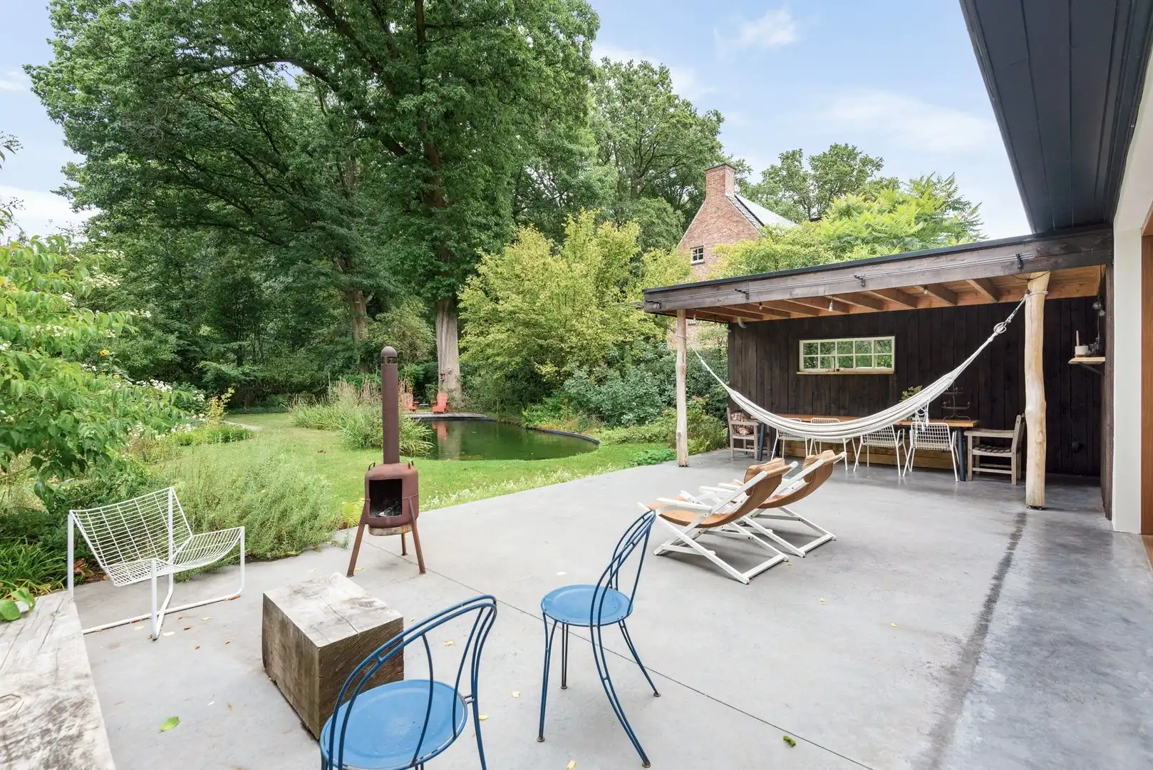 Stijlvolle, vrijstaande villa met zonnige tuin en zwemvijver foto 17